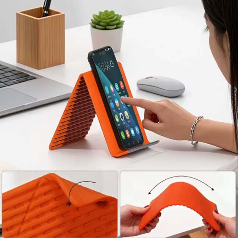 Laptop Stand - ขาตั้งโทรศัพท์แบบพกพาซิลิโคนสำหรับวางบนโต๊ะ แท็บเล็ต แล็ปท็อป ดีไซน์สร้างสรรค์ ยืดหยุ่น พับได้